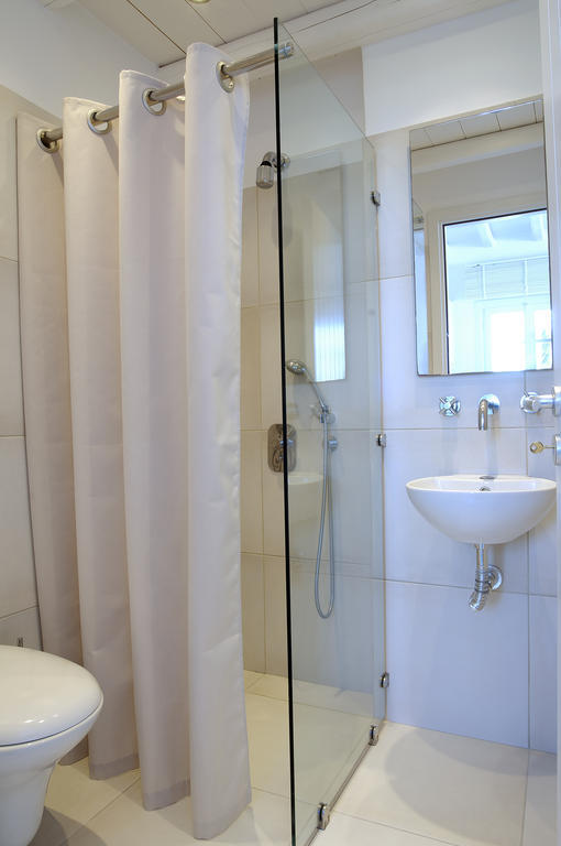 פולוניה Kapetan Tasos Suites חדר תמונה